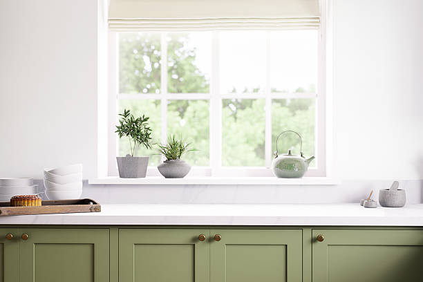 istock Modern green kitchen with natural accents and incredibly stylish decor elements 2212546189
