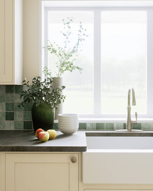 istock This is a stylish and modern kitchen, decorated with beautiful green accents and an open layout 2212546303