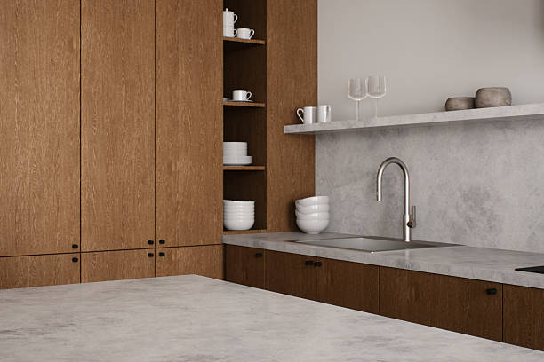istock This modern kitchen has wooden cabinetry and marble countertops, creating an effortlessly minimalistic vibe. 3D Render 2212546486