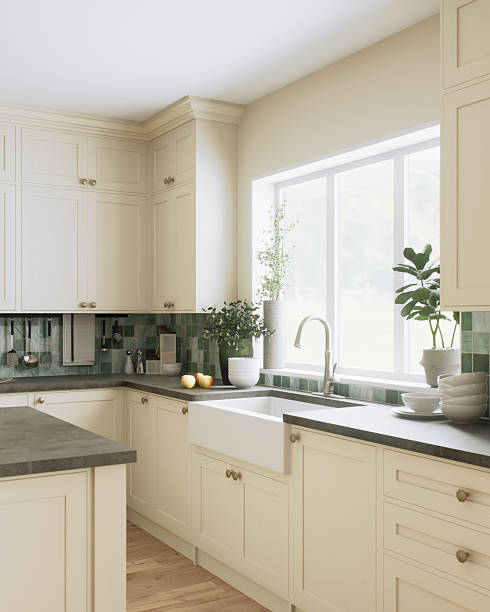 istock This is a stylish and modern kitchen, decorated with beautiful green accents and an open layout 2212546924