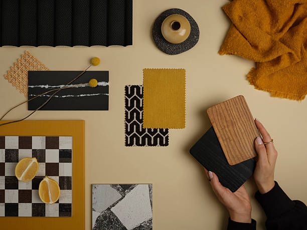 istock A mustard yellow and black contrast mood board with geometric patterns, wood samples, and natural textures, bringing warmth and depth. 2212548021