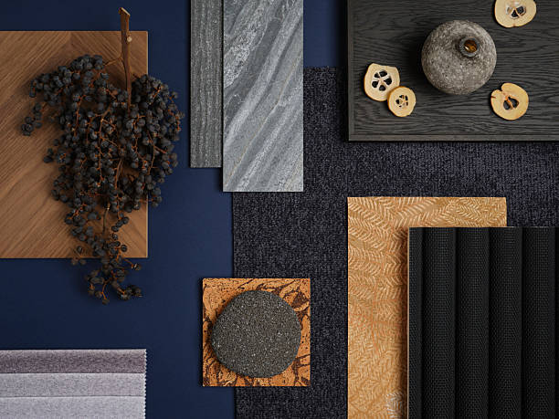istock Dark and moody material composition with deep blue, grey stone, wood, and textured fabrics. A sophisticated palette for modern interiors. 2212548364