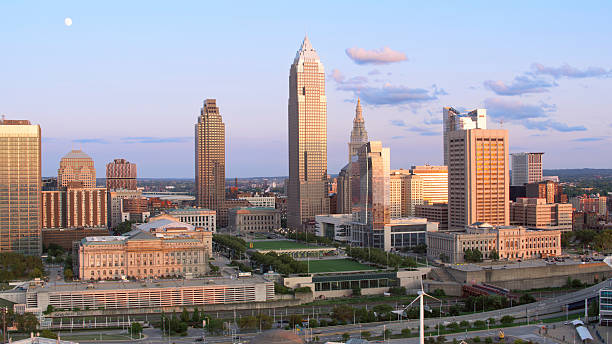 istock Cleveland Downtown Skyline With Key Tower and Historic Architecture Under Evening Light And Purple Clouds 2212548836