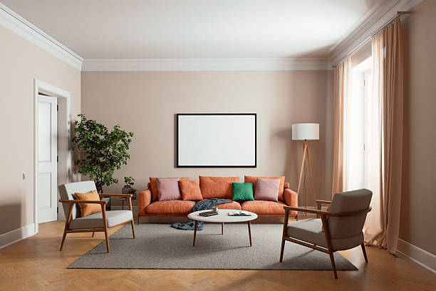 istock The modern living room features a stylish orange sofa complemented by ample natural light 2212549906
