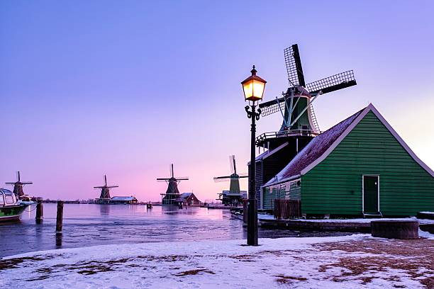 istock Charming winter evening at Zaanse Schans with historic windmills and tranquil waters 2212550478