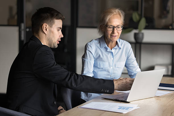 istock Young businessman CEO manager explains online project 2212551413