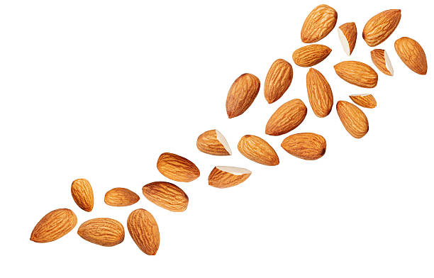 istock Almond nuts  levitating in air isolated on white.  Falling crushed almonds nuts. Almonds is torn to pieces explosion with crumbs. 2212555829