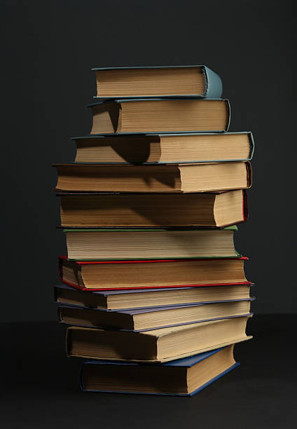 istock Open book, hardback colorful books on table. Back to school. Copy space for text. Education business concept 2212556203