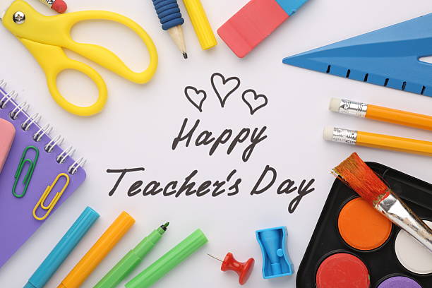 istock Teacher's Day celebration with students, gifts, and gratitude 2212556330