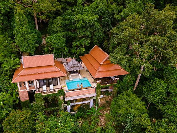 Luxurious tropical villa with private pool nestled in lush greenery for a serene getaway