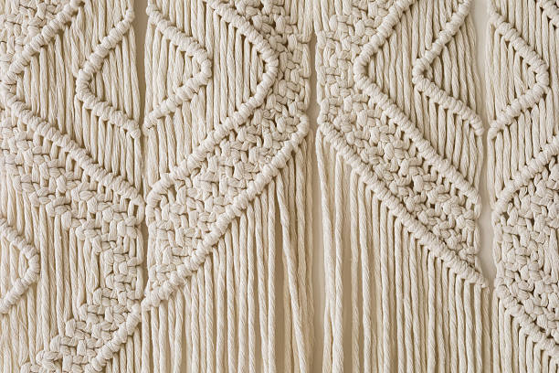 istock Macrame wall hanging featuring intricate patterns and textures crafted from natural fibers 2212558994