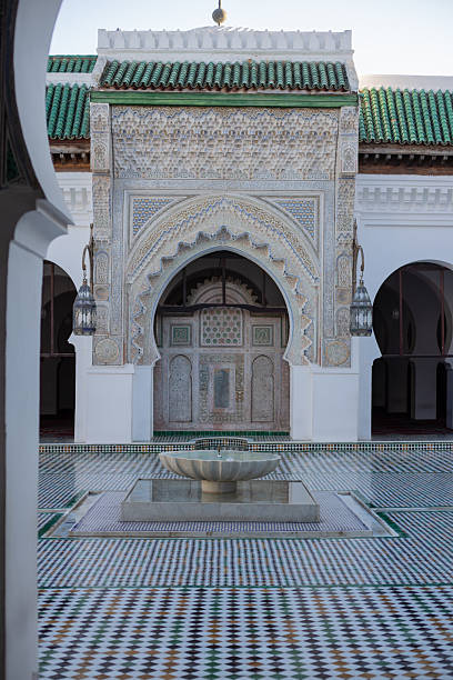 istock Architectural detail on a beautiful square and Arabic style patterns and arch heritage architecture building in a famous landmark in Medina District in Fez, Morocco 2212565502