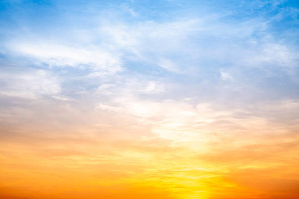 istock Beautiful , luxury soft gradient orange gold clouds and sunlight on the blue sky perfect for the background, take in evening,Twilight, Large size, high definition landscape photo 2212566577