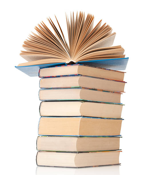 istock Stack of books close up isolated on a white background 2212569782