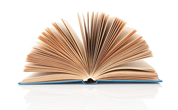 istock Open book close up isolated on white background 2212569813