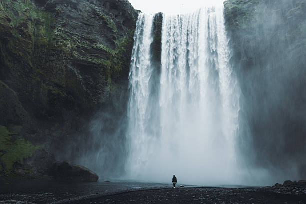 istock Traveller Admiring Unbelievable Landscape with Waterfall View 2212573513