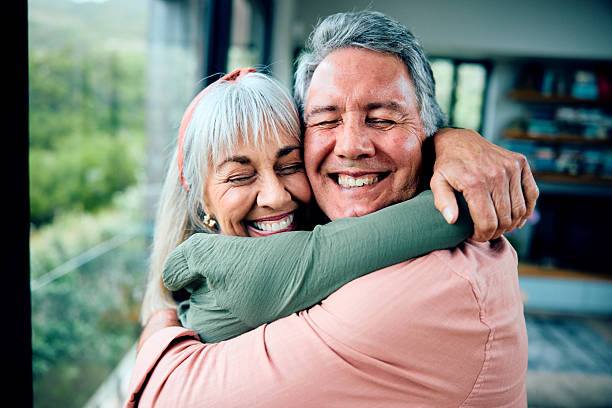 istock Affectionate senior couple embracing, eyes closed 2212575773