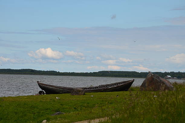istock One Boat Next to the Sea 2212576139