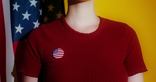 istock Expressing patriotism with a flag pin and vibrant backdrops 2212580162