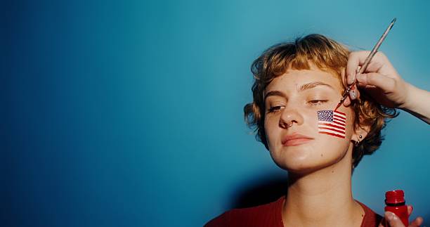 istock Creative face painting with patriotic art for celebration 2212580768