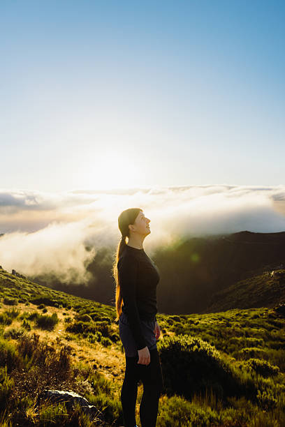 istock Happy Female Admiring Dramatic Sunrise Above Madeira Mountains 2212581208