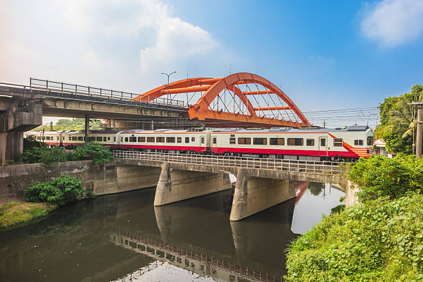 istock Heritage train pass the bridge at Rende, Tainan, taiwan 2212581950