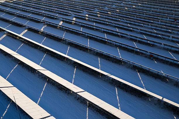 istock Snow-Covered Solar Farm Facing Winter Energy Challenges 2212584975