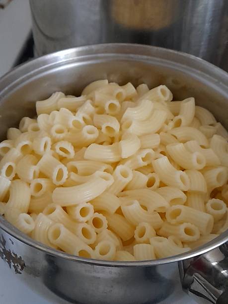 istock Homemade cooked pasta in ccoking pan. 2212585642