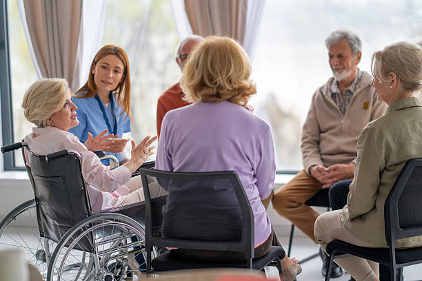 istock Engaged Seniors in a Meaningful Group Conversation 2212586914