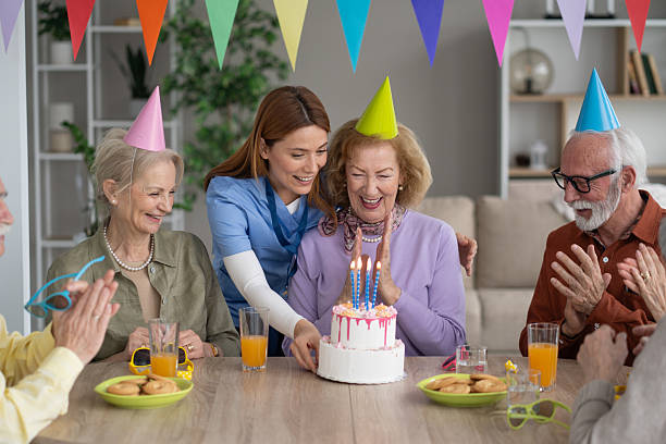 Elderly Woman's Delightful Birthday Celebration with Cake