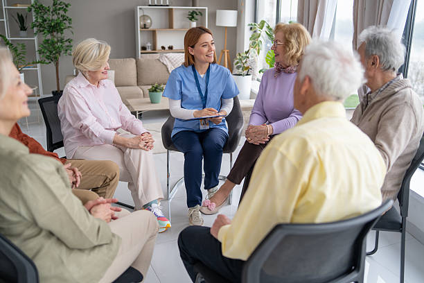 istock Elderly women sharing laughter during a group discussion 2212587026