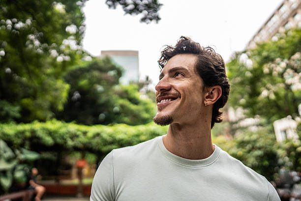istock Young man contemplating at public park 2212589657