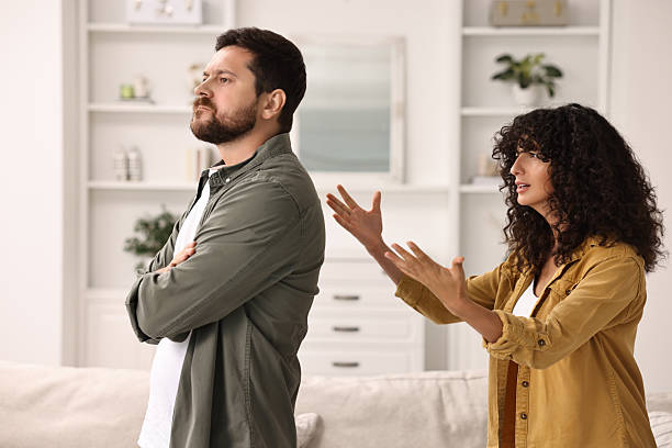 istock Emotional couple having quarrel at home. Relationship problems 2212593009