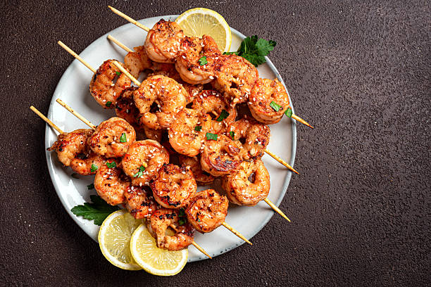 istock Grilled shrimps skewers 2212593938