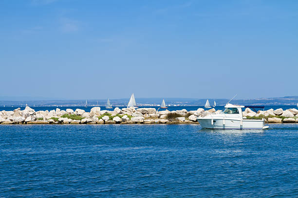 seascape with clear calm mediterranean sea waters with yachts, Martigues, Provence, Cote dAzur, France