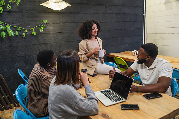 istock Young multiethnic entrepreneurs brainstorming in a coworking space 2212597217