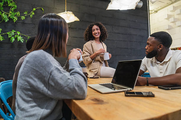 istock Young multiethnic colleagues having a meeting in a coworking space 2212597575