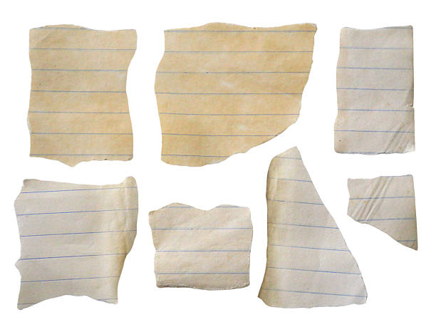 istock Pieces of notebook paper with white old torn or cut lines. Design elements isolated on transparent background. 2212600920