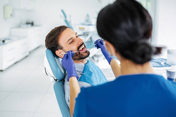 istock Qualified Dental Professional Giving Oral Checkup 2212601648