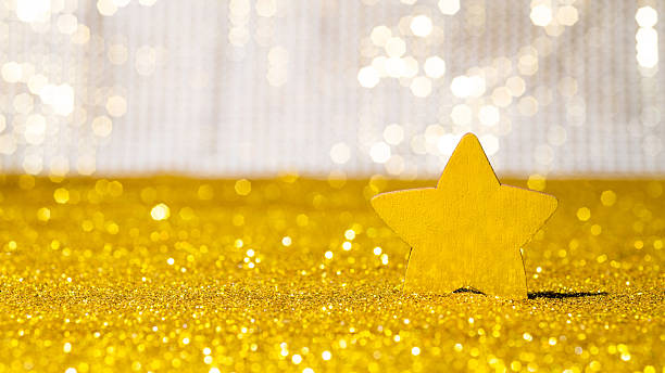 Christmas star on shiny golden background.