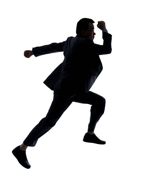 istock Businessman running on white background 2212602206