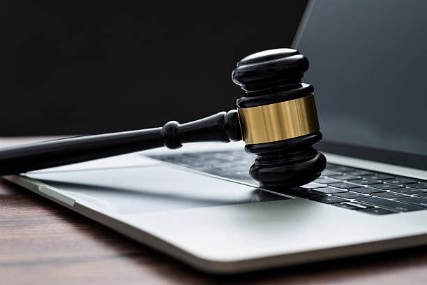 istock Gavel and laptop on the table 2212603285