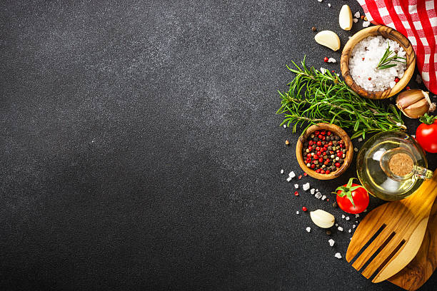 istock Healthy food, cooking background on black. 2212603365