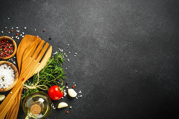 istock Healthy food, cooking background on black. 2212603370