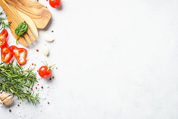 istock Cooking background with herbs, spices and vegetables. 2212603460