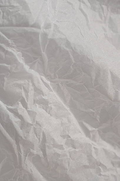 istock light gray crumpled paper texture as background, old kraft paper as background, crumpled packing material texture as background photo above 2212603485