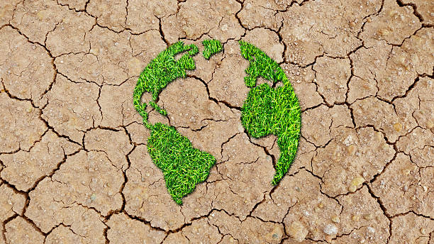 istock Green World Map. tree or forest shape of world map isolated on white background. World Map Green Planet Earth Day or Environment day Concept. Green earth with electric car. Paris agreement concept. 2212603779