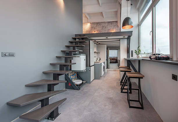 istock Modern Loft Apartment Kitchen with Staircase and Minimalist Design 2212604762