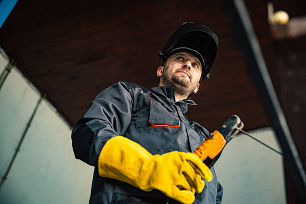 istock Metal worker welding metal frame 2212605091