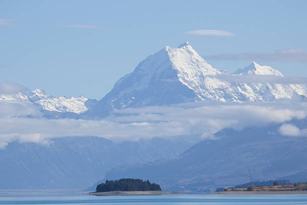istock Majestic Snow-Capped Mountains Over Serene Lake 2212612886